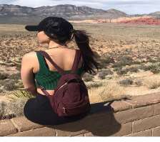 She likes to sit quite and stare at the desert land. This gives peace to her mind.